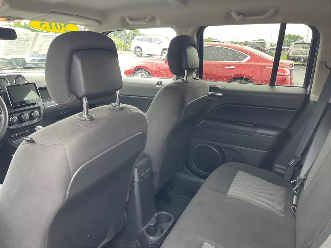 2015 Jeep Patriot Latitude (1C4NJRFB0FD) with an 2.4L I-4 DOHC engine, located at 4508 South Dixie Dr, Moraine, OH, 45439, (937) 908-9800, 39.689976, -84.218452 - Photo#9