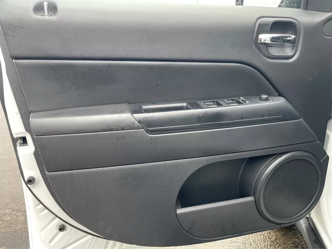 2015 Jeep Patriot Latitude (1C4NJRFB0FD) with an 2.4L I-4 DOHC engine, located at 4508 South Dixie Dr, Moraine, OH, 45439, (937) 908-9800, 39.689976, -84.218452 - Photo#16