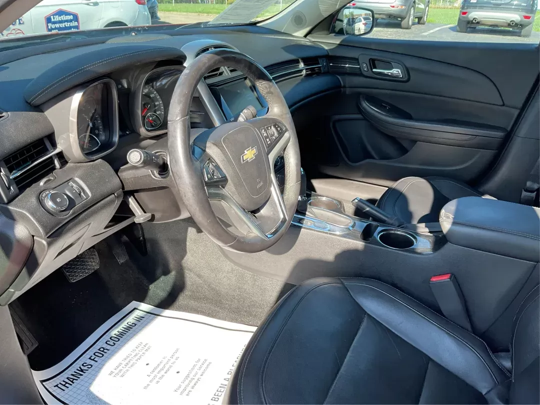 2014 Chevrolet Malibu 2LT (1G11E5SL7EU) with an ECOTEC 2.5L I-4 gasoline direct injection engine, located at 8750 N County Rd 25A, Piqua, OH, 45356, (937) 908-9800, 40.164391, -84.232513 - **Hit the Road in Style: 2014 Chevrolet Malibu 2LT - Your Perfect Daily Driver!**<br /> <br /> Are you ready to elevate your daily commute or weekend adventures? This 2014 Chevrolet Malibu 2LT, with its striking Butte Red Metallic exterior, is not just any sedan; it's a lifestyle upgrade! Whether yo - Photo#8