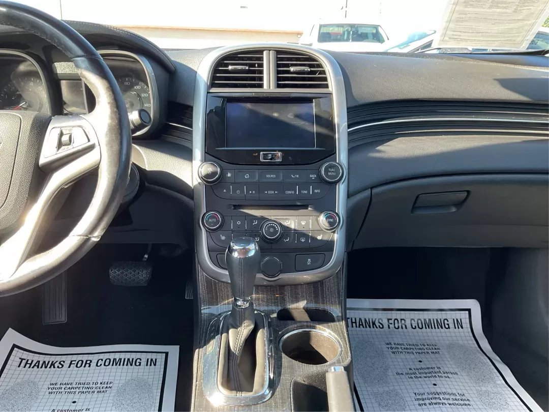 2014 Chevrolet Malibu 2LT (1G11E5SL7EU) with an ECOTEC 2.5L I-4 gasoline direct injection engine, located at 8750 N County Rd 25A, Piqua, OH, 45356, (937) 908-9800, 40.164391, -84.232513 - **Hit the Road in Style: 2014 Chevrolet Malibu 2LT - Your Perfect Daily Driver!**<br /> <br /> Are you ready to elevate your daily commute or weekend adventures? This 2014 Chevrolet Malibu 2LT, with its striking Butte Red Metallic exterior, is not just any sedan; it's a lifestyle upgrade! Whether yo - Photo#12