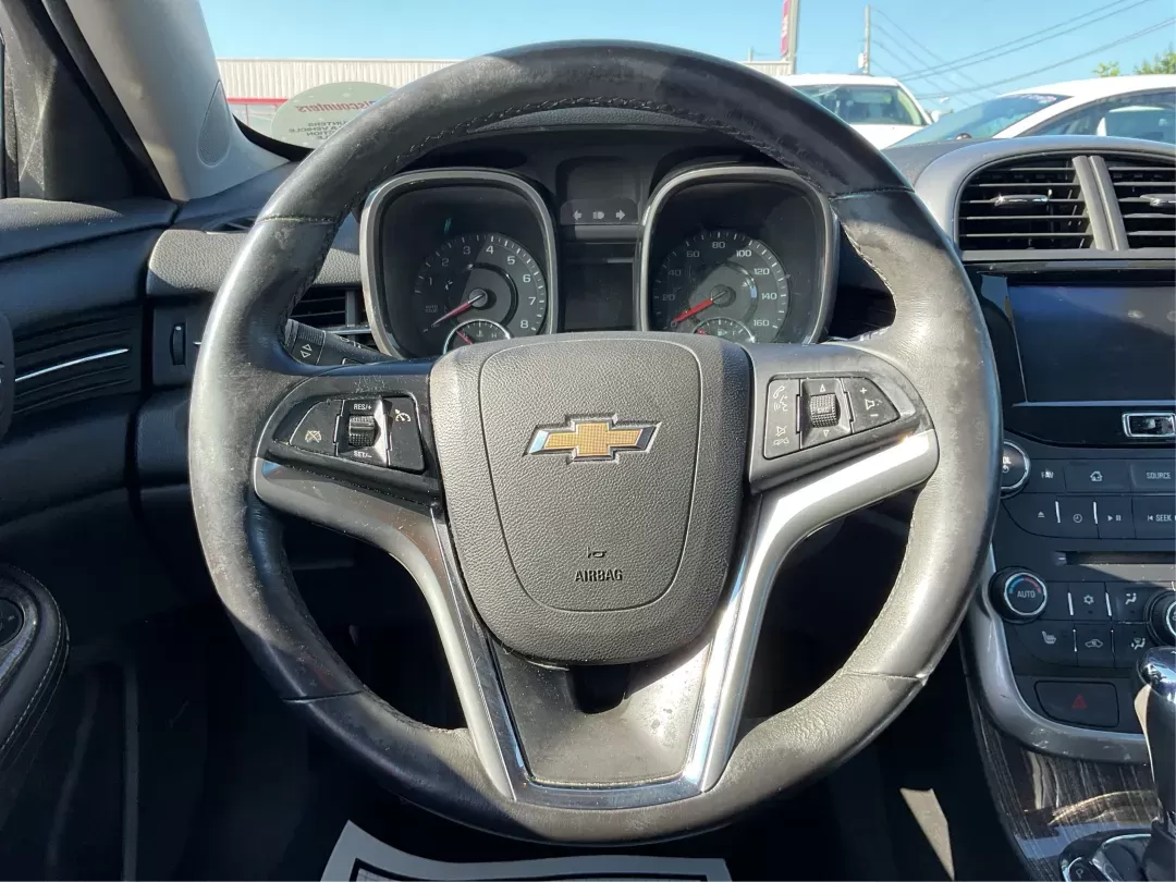2014 Chevrolet Malibu 2LT (1G11E5SL7EU) with an ECOTEC 2.5L I-4 gasoline direct injection engine, located at 8750 N County Rd 25A, Piqua, OH, 45356, (937) 908-9800, 40.164391, -84.232513 - **Hit the Road in Style: 2014 Chevrolet Malibu 2LT - Your Perfect Daily Driver!**<br /> <br /> Are you ready to elevate your daily commute or weekend adventures? This 2014 Chevrolet Malibu 2LT, with its striking Butte Red Metallic exterior, is not just any sedan; it's a lifestyle upgrade! Whether yo - Photo#15