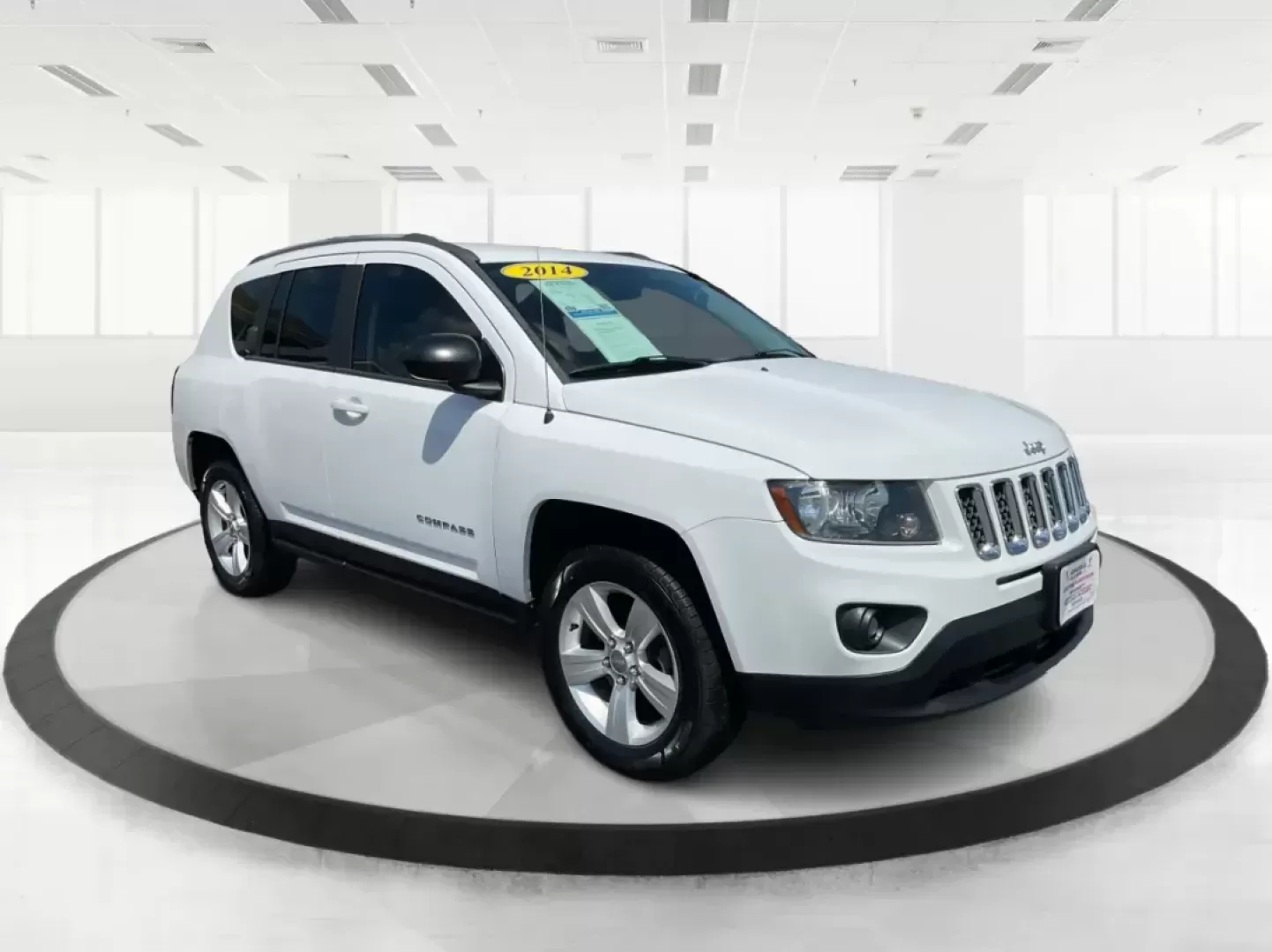 2014 Jeep Compass Sport (1C4NJDBB6ED) with an 2.4L I-4 DOHC engine, located at 401 Woodman Dr, Riverside, OH, 45431, (937) 908-9800, 39.760899, -84.123421 - Photo#0