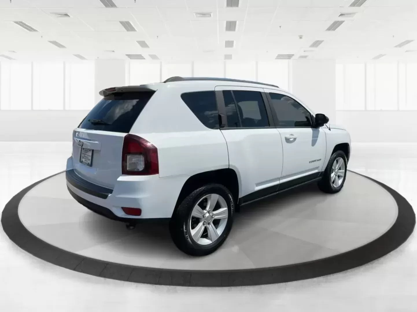 2014 Jeep Compass Sport (1C4NJDBB6ED) with an 2.4L I-4 DOHC engine, located at 401 Woodman Dr, Riverside, OH, 45431, (937) 908-9800, 39.760899, -84.123421 - Photo#2