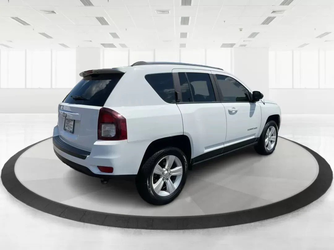 2014 Jeep Compass Sport (1C4NJDBB6ED) with an 2.4L I-4 DOHC engine, located at 401 Woodman Dr, Riverside, OH, 45431, (937) 908-9800, 39.760899, -84.123421 - Photo#2
