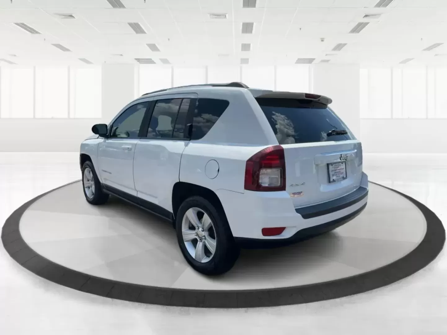 2014 Jeep Compass Sport (1C4NJDBB6ED) with an 2.4L I-4 DOHC engine, located at 401 Woodman Dr, Riverside, OH, 45431, (937) 908-9800, 39.760899, -84.123421 - Photo#4