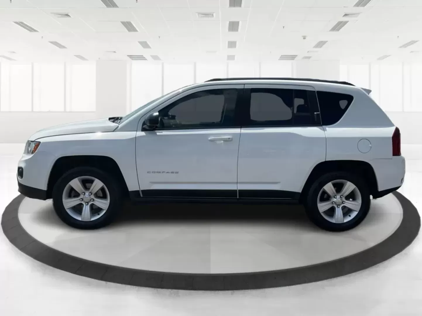 2014 Jeep Compass Sport (1C4NJDBB6ED) with an 2.4L I-4 DOHC engine, located at 401 Woodman Dr, Riverside, OH, 45431, (937) 908-9800, 39.760899, -84.123421 - Photo#5