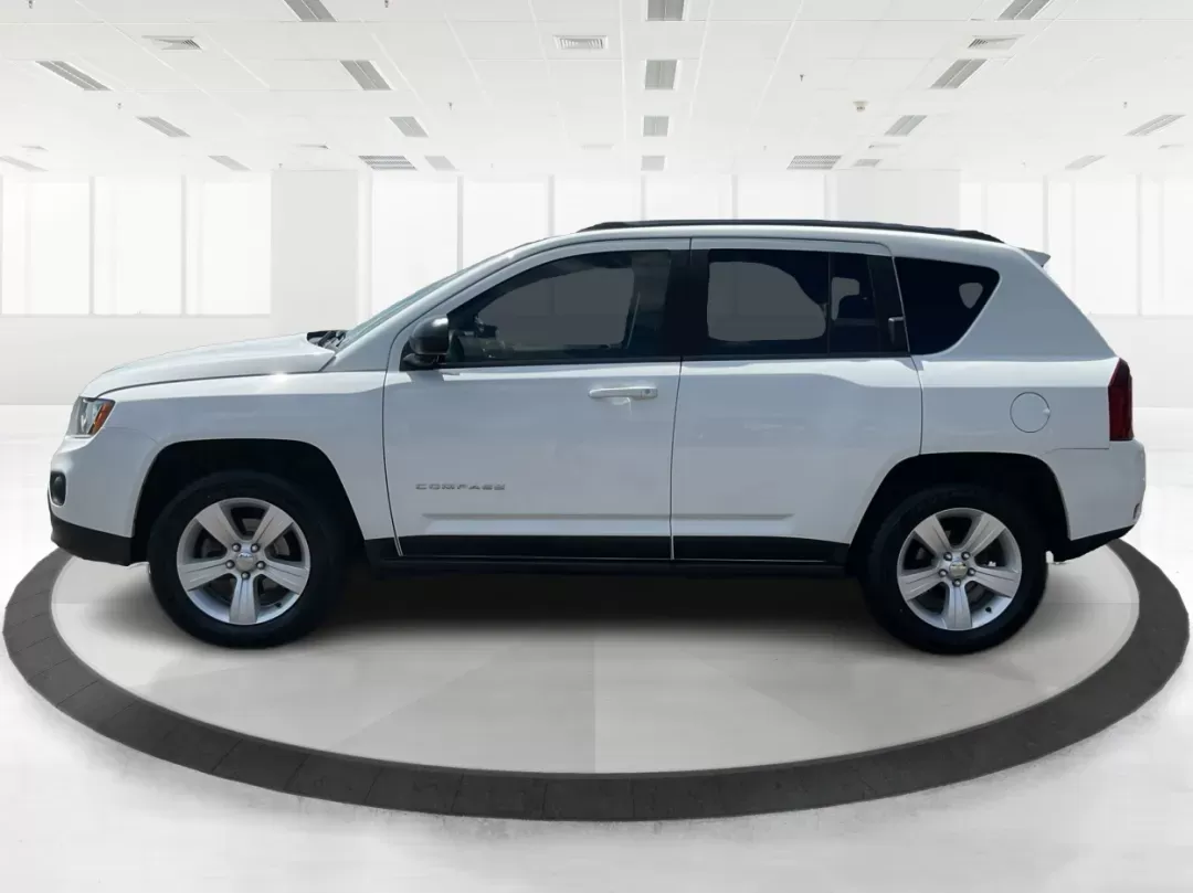 2014 Jeep Compass Sport (1C4NJDBB6ED) with an 2.4L I-4 DOHC engine, located at 401 Woodman Dr, Riverside, OH, 45431, (937) 908-9800, 39.760899, -84.123421 - Photo#5