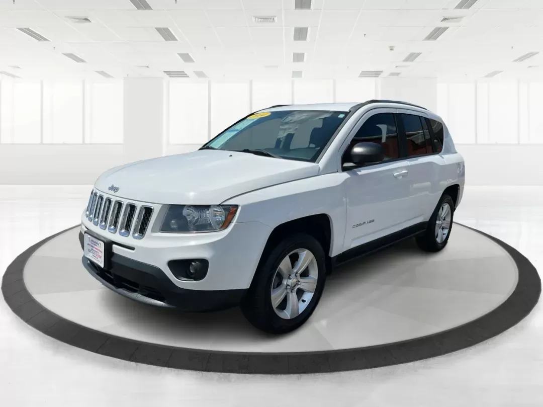 2014 Jeep Compass Sport (1C4NJDBB6ED) with an 2.4L I-4 DOHC engine, located at 401 Woodman Dr, Riverside, OH, 45431, (937) 908-9800, 39.760899, -84.123421 - Photo#7