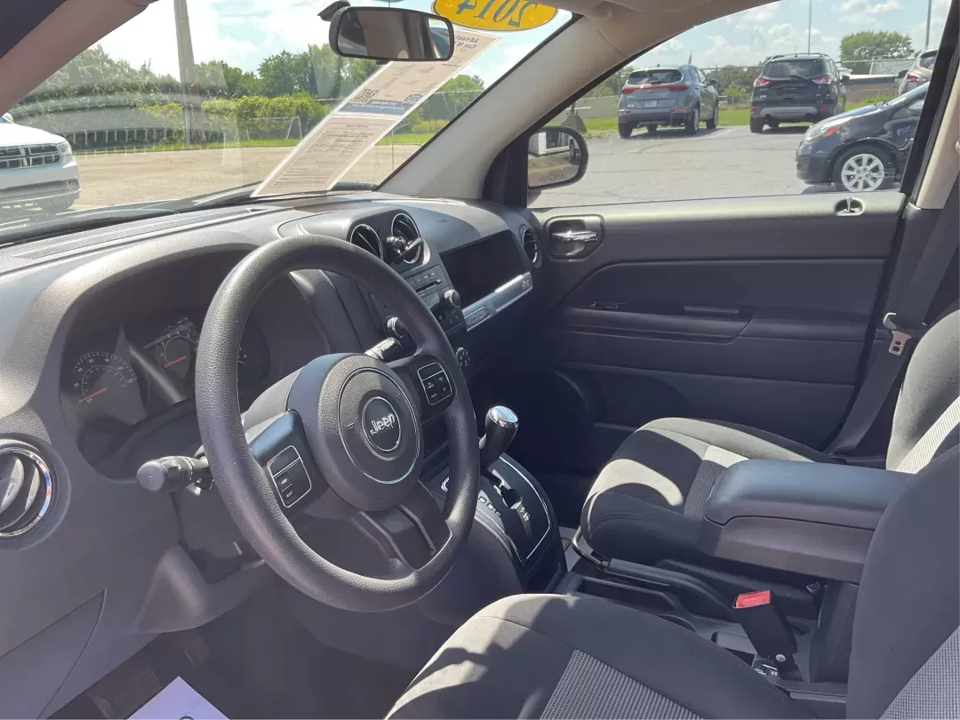 2014 Jeep Compass Sport (1C4NJDBB6ED) with an 2.4L I-4 DOHC engine, located at 401 Woodman Dr, Riverside, OH, 45431, (937) 908-9800, 39.760899, -84.123421 - Photo#8