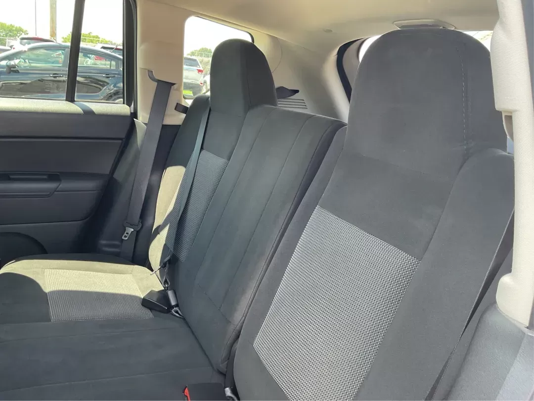 2014 Jeep Compass Sport (1C4NJDBB6ED) with an 2.4L I-4 DOHC engine, located at 401 Woodman Dr, Riverside, OH, 45431, (937) 908-9800, 39.760899, -84.123421 - Photo#9