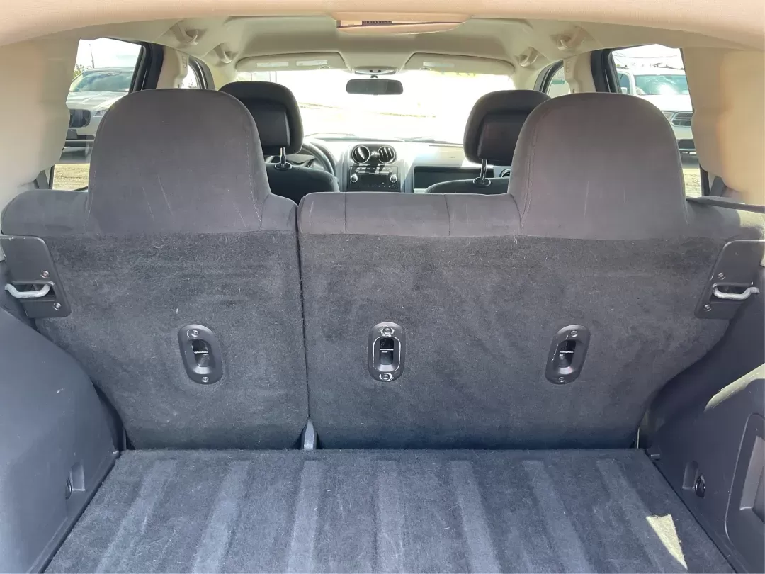 2014 Jeep Compass Sport (1C4NJDBB6ED) with an 2.4L I-4 DOHC engine, located at 401 Woodman Dr, Riverside, OH, 45431, (937) 908-9800, 39.760899, -84.123421 - Photo#11