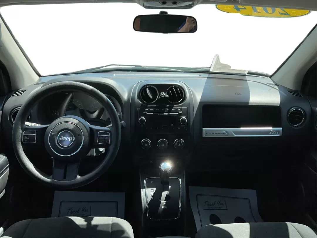 2014 Jeep Compass Sport (1C4NJDBB6ED) with an 2.4L I-4 DOHC engine, located at 401 Woodman Dr, Riverside, OH, 45431, (937) 908-9800, 39.760899, -84.123421 - Photo#19