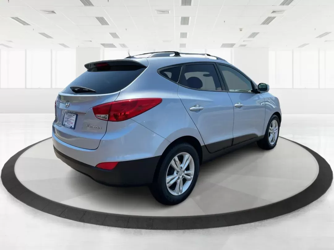 2012 Hyundai Tucson GLS (KM8JU3AC7CU) with an Theta II 2.4L I-4 DOHC engine, located at 1184 Kauffman Ave, Fairborn, OH, 45324, (937) 908-9800, 39.807072, -84.030914 - Photo#2