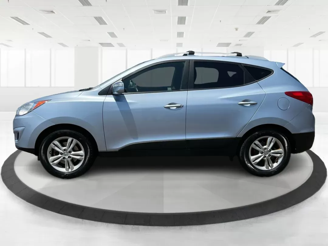 2012 Hyundai Tucson GLS (KM8JU3AC7CU) with an Theta II 2.4L I-4 DOHC engine, located at 1184 Kauffman Ave, Fairborn, OH, 45324, (937) 908-9800, 39.807072, -84.030914 - Photo#5