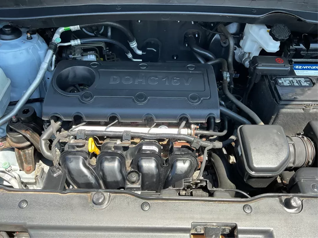 2012 Hyundai Tucson GLS (KM8JU3AC7CU) with an Theta II 2.4L I-4 DOHC engine, located at 1184 Kauffman Ave, Fairborn, OH, 45324, (937) 908-9800, 39.807072, -84.030914 - Photo#10