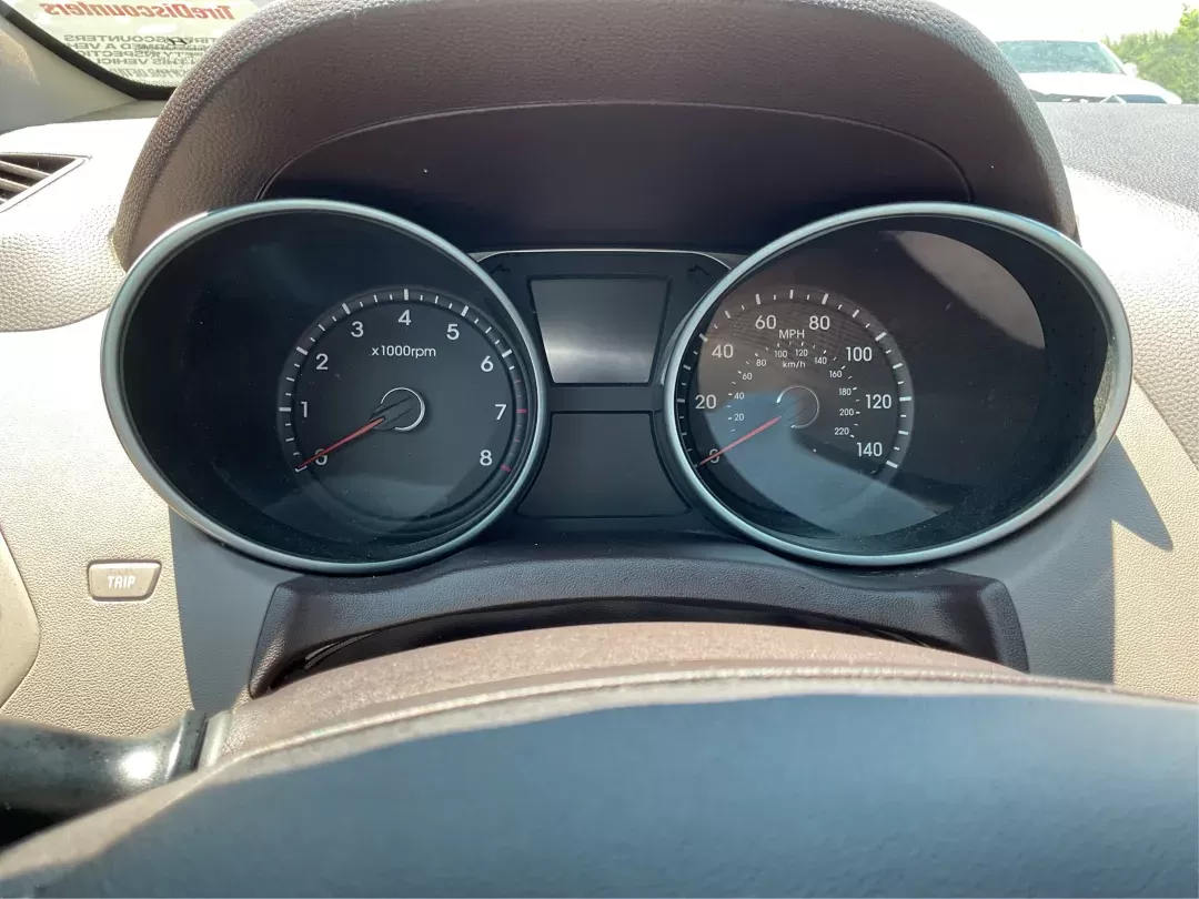 2012 Hyundai Tucson GLS (KM8JU3AC7CU) with an Theta II 2.4L I-4 DOHC engine, located at 1184 Kauffman Ave, Fairborn, OH, 45324, (937) 908-9800, 39.807072, -84.030914 - Photo#14