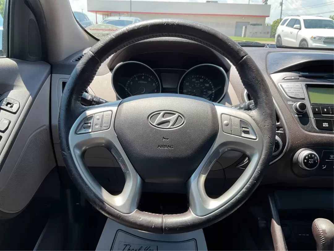 2012 Hyundai Tucson GLS (KM8JU3AC7CU) with an Theta II 2.4L I-4 DOHC engine, located at 1184 Kauffman Ave, Fairborn, OH, 45324, (937) 908-9800, 39.807072, -84.030914 - Photo#15