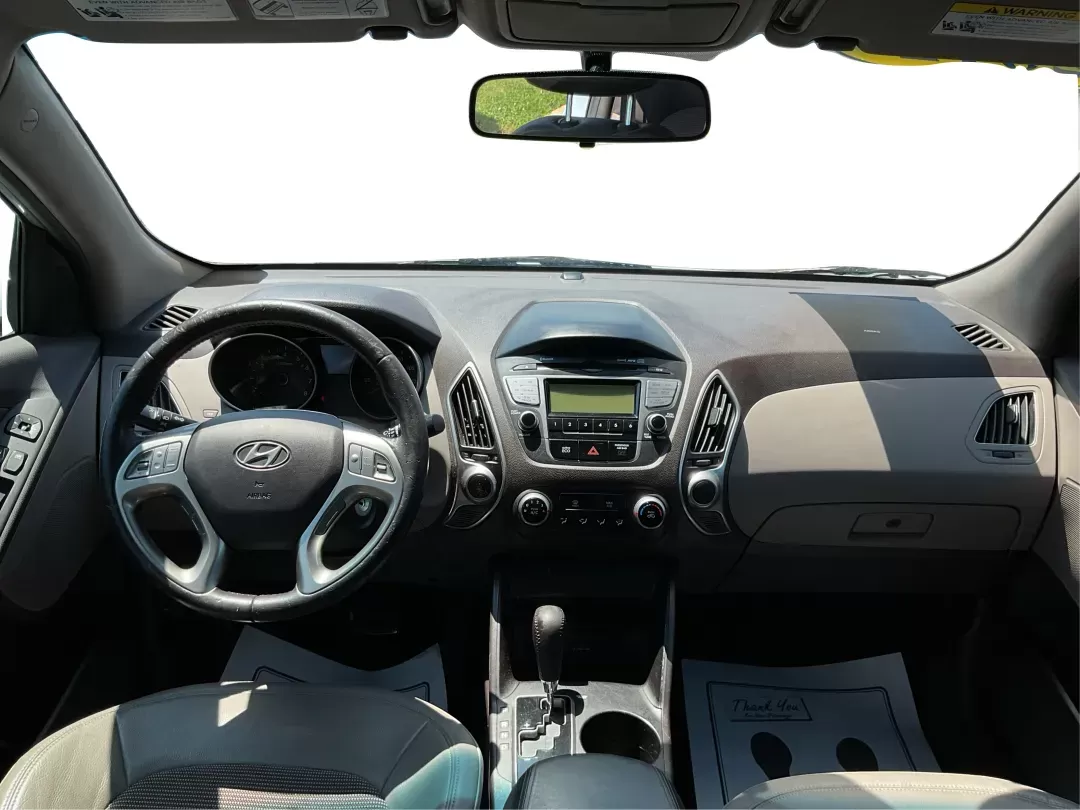 2012 Hyundai Tucson GLS (KM8JU3AC7CU) with an Theta II 2.4L I-4 DOHC engine, located at 1184 Kauffman Ave, Fairborn, OH, 45324, (937) 908-9800, 39.807072, -84.030914 - Photo#18
