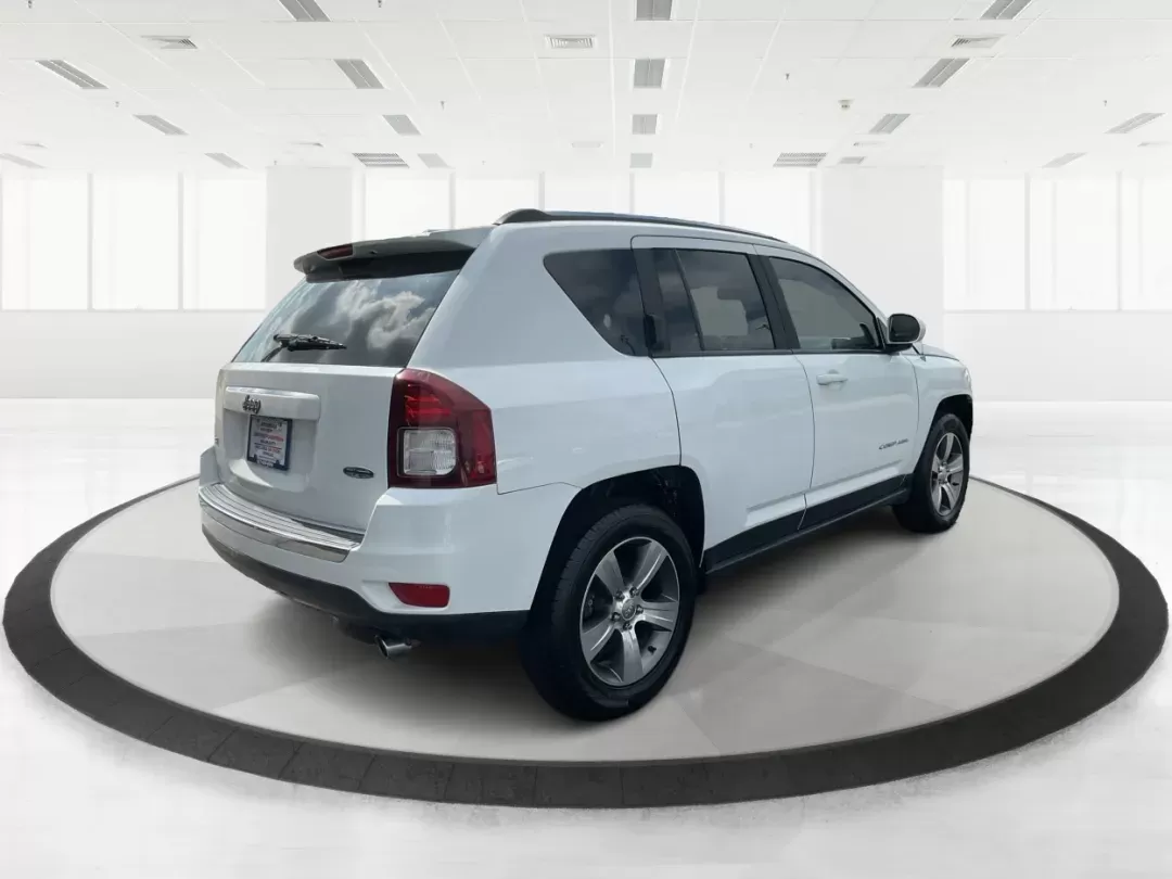 2016 Jeep Compass High Altitude Edition (1C4NJDEB6GD) with an 2.4L I-4 DOHC engine, located at 8750 N County Rd 25A, Piqua, OH, 45356, (937) 908-9800, 40.164391, -84.232513 - Photo#2