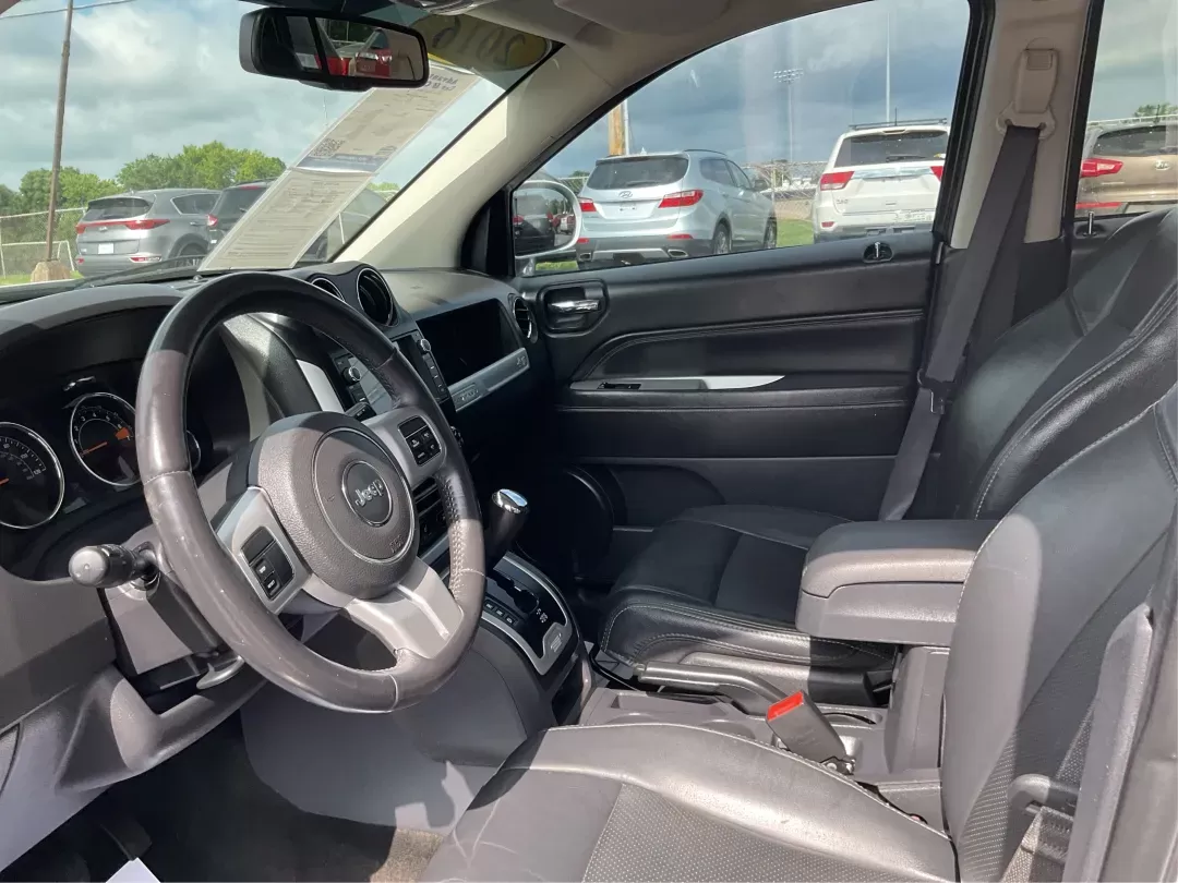2016 Jeep Compass High Altitude Edition (1C4NJDEB6GD) with an 2.4L I-4 DOHC engine, located at 8750 N County Rd 25A, Piqua, OH, 45356, (937) 908-9800, 40.164391, -84.232513 - Photo#8