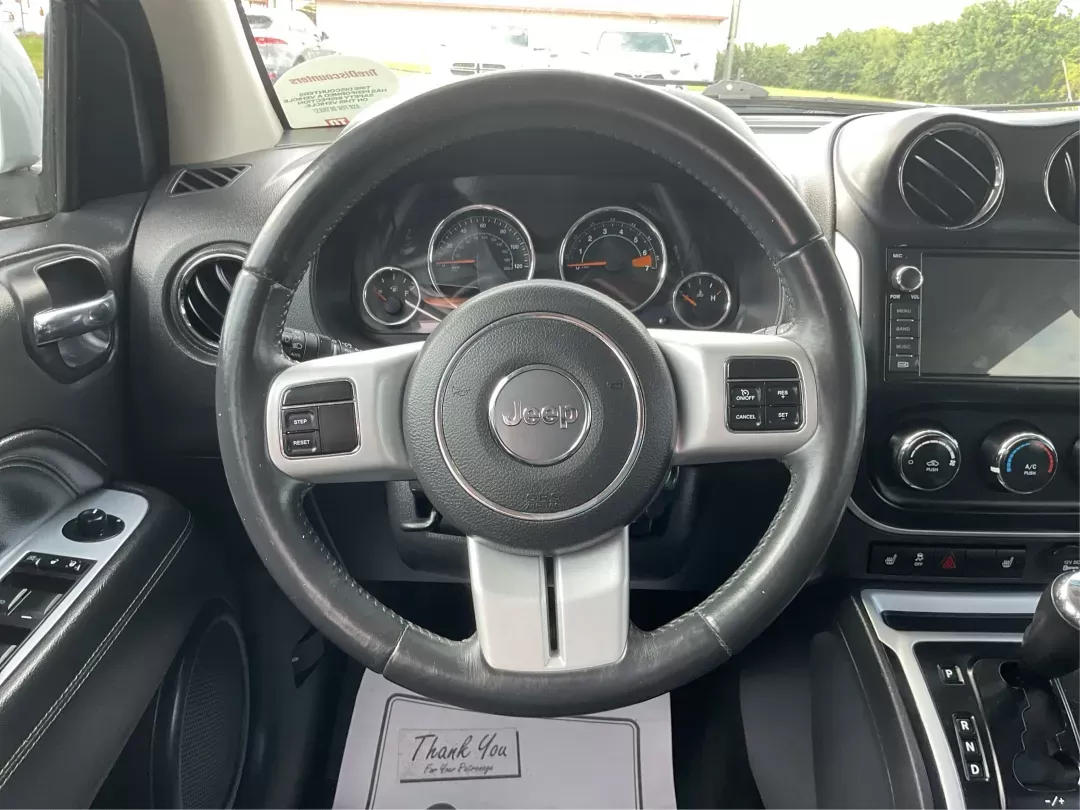 2016 Jeep Compass High Altitude Edition (1C4NJDEB6GD) with an 2.4L I-4 DOHC engine, located at 8750 N County Rd 25A, Piqua, OH, 45356, (937) 908-9800, 40.164391, -84.232513 - Photo#15