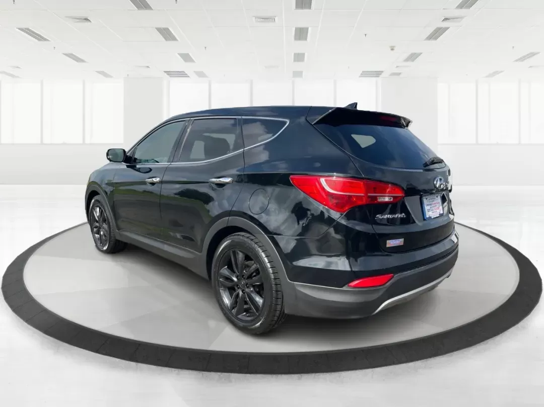 2013 Hyundai Santa Fe Sport 2.0T (5XYZW3LA4DG) with an Theta II 2L I-4 gasoline direct injection engine, located at 1184 Kauffman Ave, Fairborn, OH, 45324, (937) 908-9800, 39.807072, -84.030914 - **Experience Adventure and Comfort with the 2013 Hyundai Santa Fe Sport 2.0T at Advantage Car and Credit!**<br /> <br /> Are you ready to elevate your driving experience? Whether you're navigating the hustle and bustle of daily commutes or planning a spontaneous weekend getaway, the 2013 Hyundai San - Photo#4