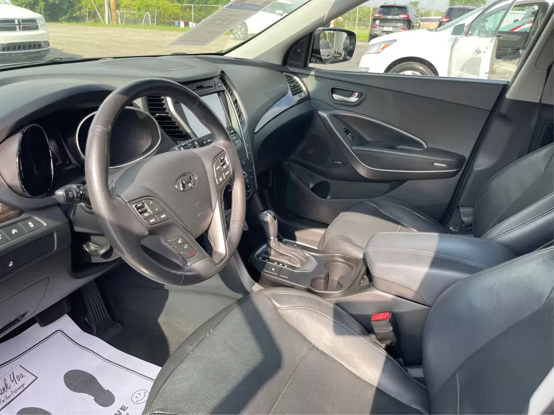 2013 Hyundai Santa Fe Sport 2.0T (5XYZW3LA4DG) with an Theta II 2L I-4 gasoline direct injection engine, located at 1184 Kauffman Ave, Fairborn, OH, 45324, (937) 908-9800, 39.807072, -84.030914 - **Experience Adventure and Comfort with the 2013 Hyundai Santa Fe Sport 2.0T at Advantage Car and Credit!**<br /> <br /> Are you ready to elevate your driving experience? Whether you're navigating the hustle and bustle of daily commutes or planning a spontaneous weekend getaway, the 2013 Hyundai San - Photo#8