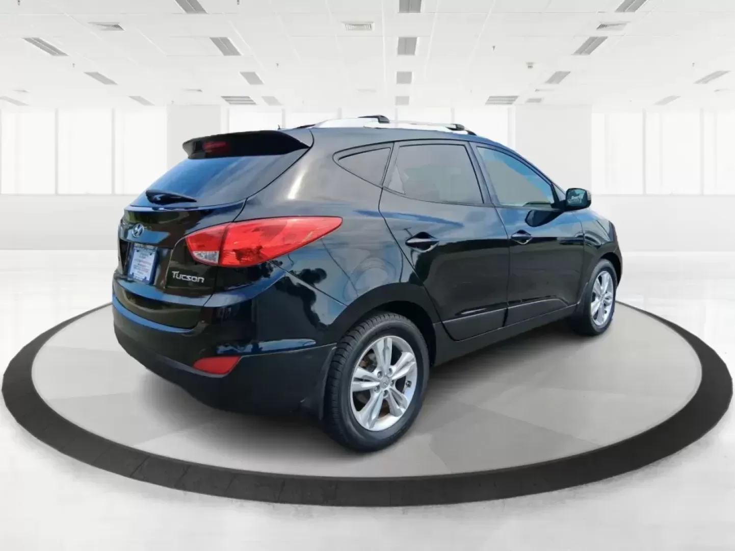 2012 Hyundai Tucson GLS (KM8JU3AC2CU) with an Theta II 2.4L I-4 DOHC engine, located at 880 E. National Road, Vandalia, OH, 45377, (937) 908-9800, 39.891918, -84.183594 - Photo#2