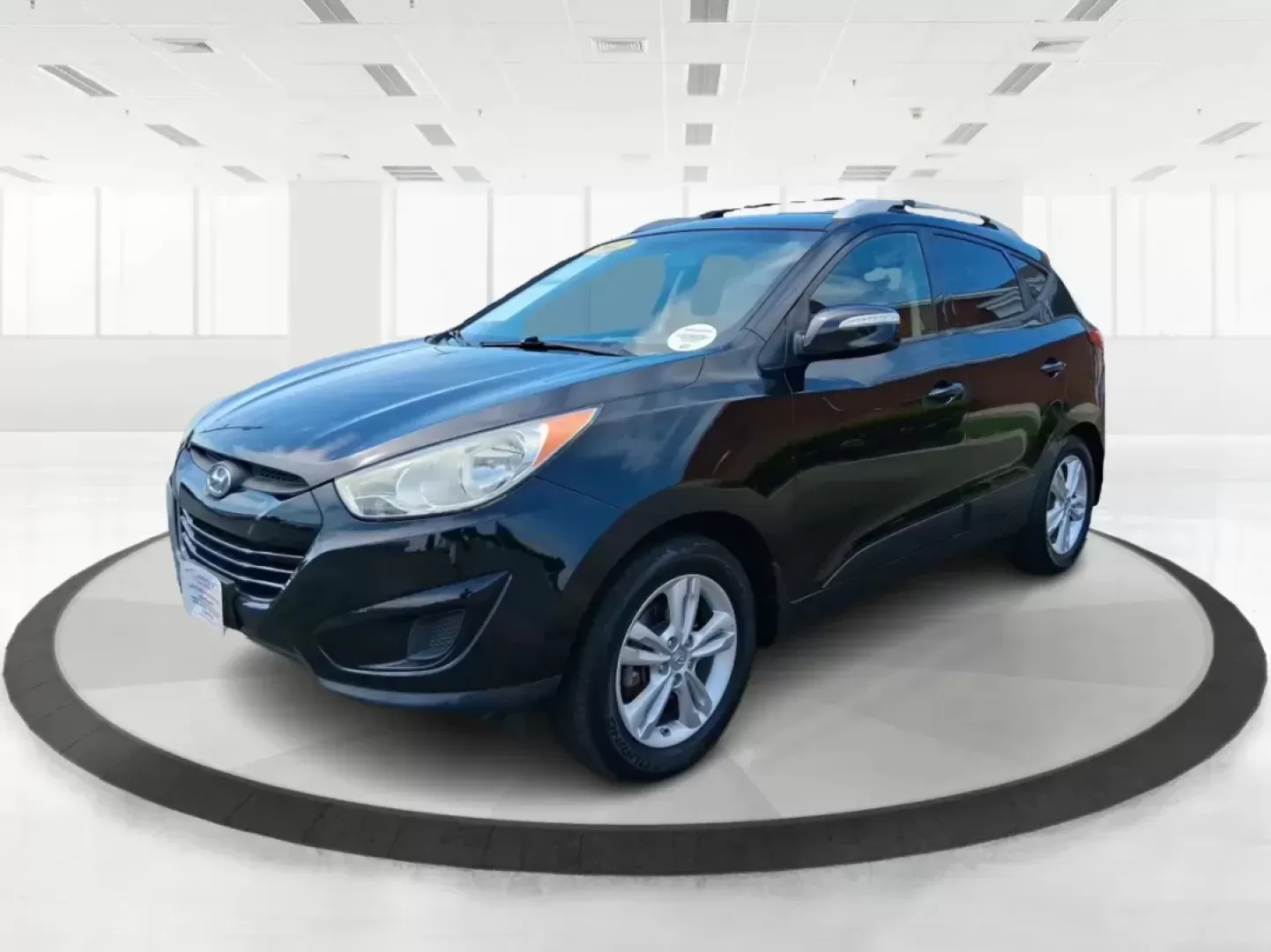2012 Hyundai Tucson GLS (KM8JU3AC2CU) with an Theta II 2.4L I-4 DOHC engine, located at 880 E. National Road, Vandalia, OH, 45377, (937) 908-9800, 39.891918, -84.183594 - Photo#7