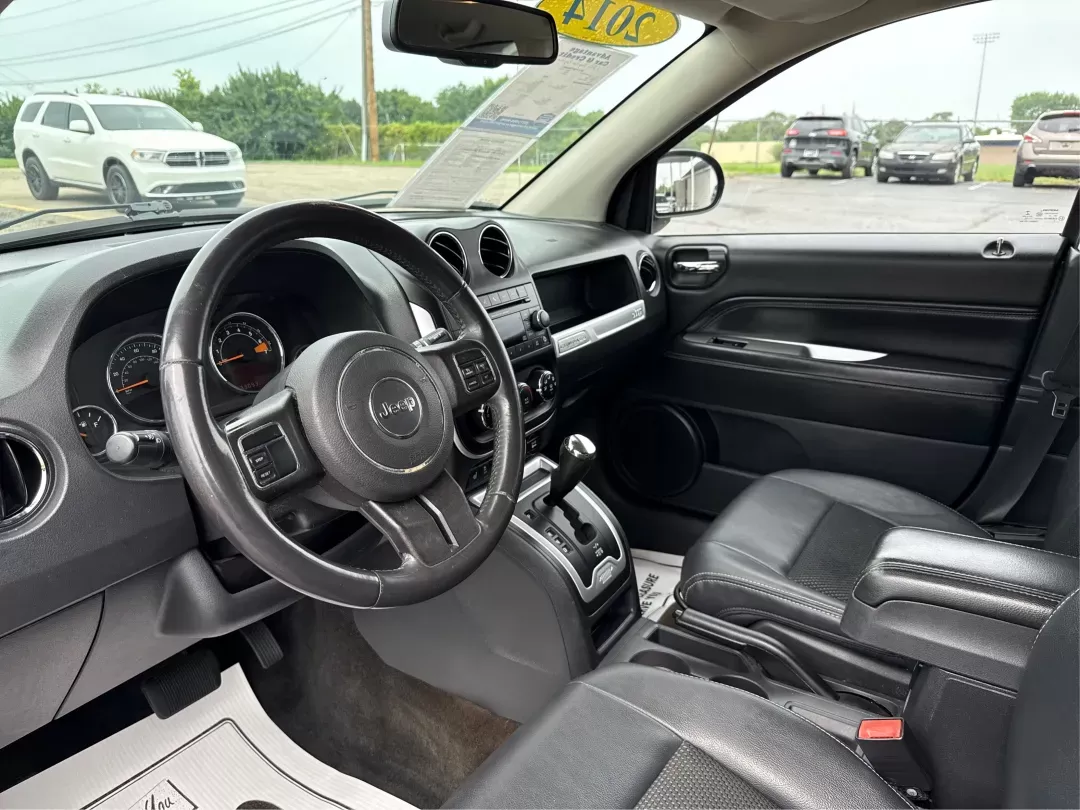 2014 Jeep Compass Latitude (1C4NJCEB4ED) with an Other engine, located at 1099 N County Rd 25A , Troy, OH, 45373, (937) 908-9800, 40.057079, -84.212883 - **Adventure Awaits in This Versatile 2014 Jeep Compass Latitude! Ideal for Family Outings and Weekend Getaways!**<br /> <br /> Are you ready to elevate your lifestyle with a vehicle that seamlessly fits into your adventures? Look no further than this robust 2014 Jeep Compass Latitude, available now - Photo#8