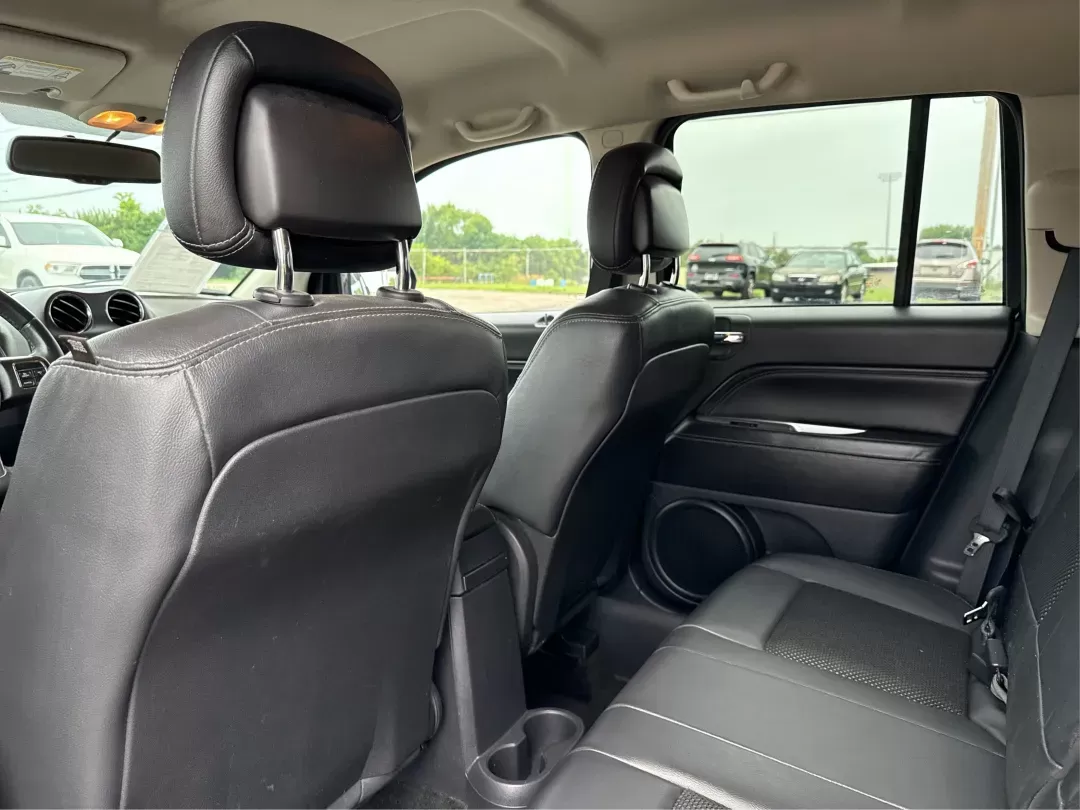 2014 Jeep Compass Latitude (1C4NJCEB4ED) with an Other engine, located at 1099 N County Rd 25A , Troy, OH, 45373, (937) 908-9800, 40.057079, -84.212883 - **Adventure Awaits in This Versatile 2014 Jeep Compass Latitude! Ideal for Family Outings and Weekend Getaways!**<br /> <br /> Are you ready to elevate your lifestyle with a vehicle that seamlessly fits into your adventures? Look no further than this robust 2014 Jeep Compass Latitude, available now - Photo#9