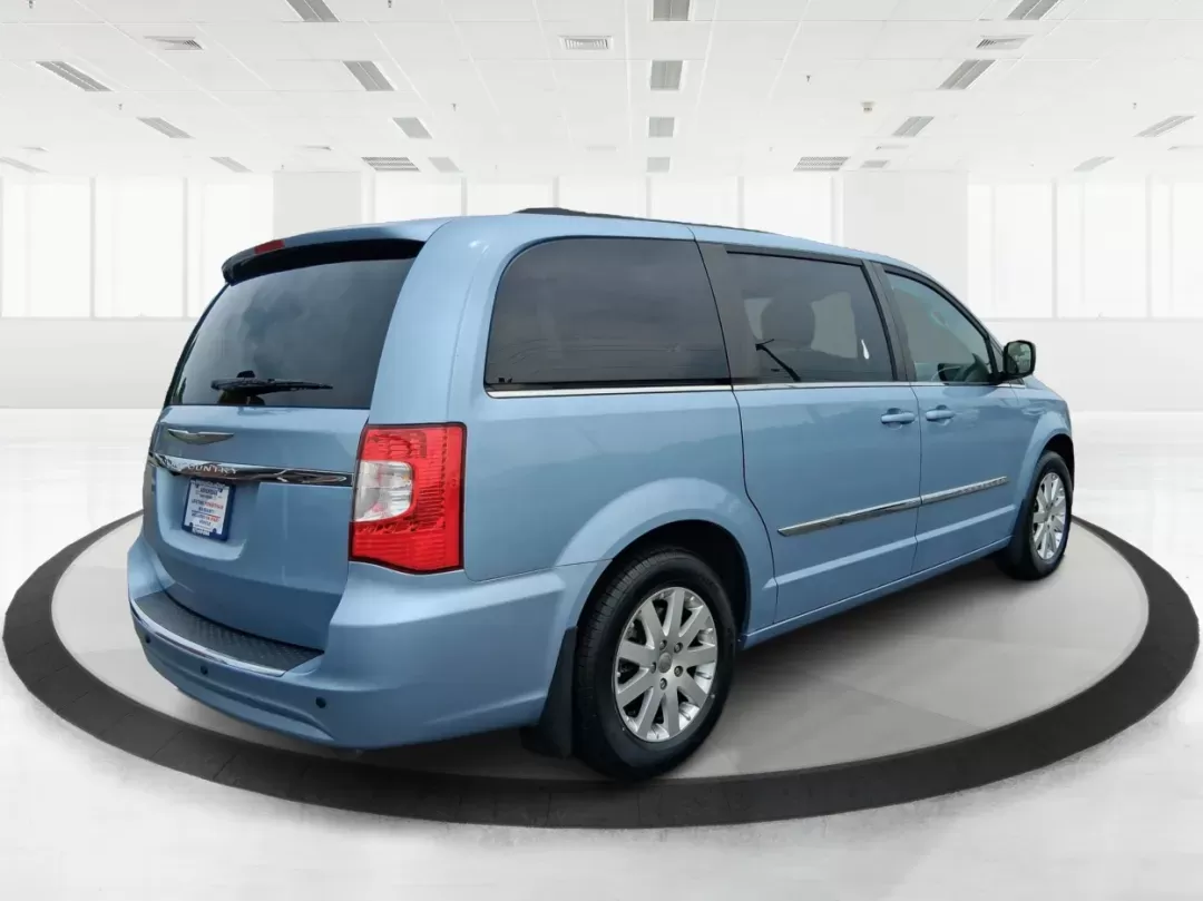 2013 Chrysler Town and Country Touring (2C4RC1BG5DR) with an Pentastar 3.6L V-6 DOHC engine, located at 401 Woodman Dr, Riverside, OH, 45431, (937) 908-9800, 39.760899, -84.123421 - **Discover Your Family's Next Adventure with the 2013 Chrysler Town and Country at Advantage Car and Credit!**<br /> <br /> Are you searching for a reliable vehicle that accommodates your growing family while offering style, comfort, and versatility? Look no further! At Advantage Car and Credit, l - Photo#2