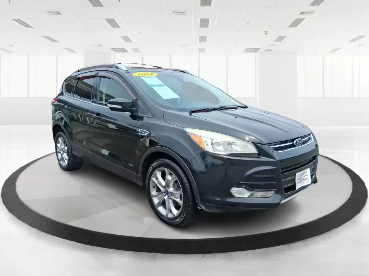 2014 Ford Escape Titanium (1FMCU9J96EU) with an EcoBoost 1.6L I-4 gasoline direct injection engine, located at 4508 South Dixie Dr, Moraine, OH, 45439, (937) 908-9800, 39.689976, -84.218452 - Photo#0