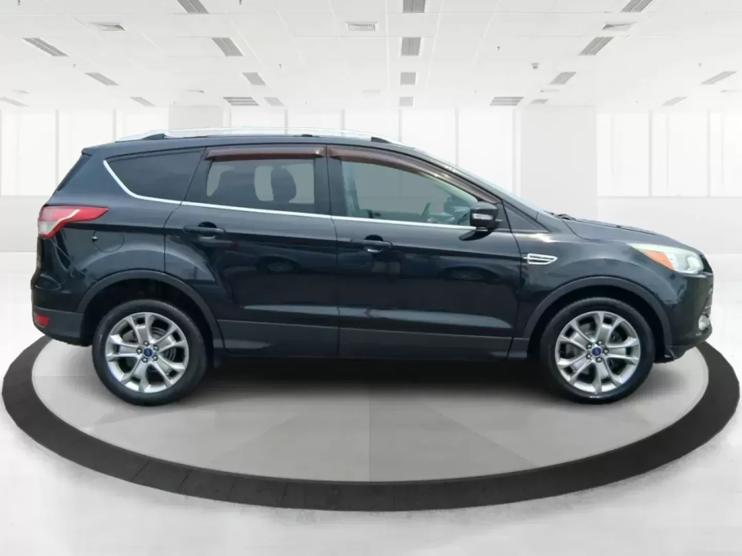 2014 Ford Escape Titanium (1FMCU9J96EU) with an EcoBoost 1.6L I-4 gasoline direct injection engine, located at 4508 South Dixie Dr, Moraine, OH, 45439, (937) 908-9800, 39.689976, -84.218452 - Photo#1