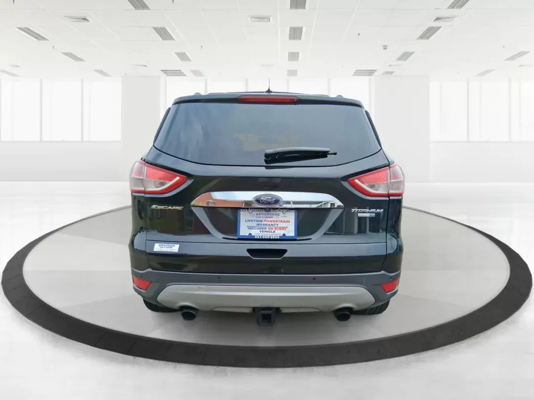 2014 Ford Escape Titanium (1FMCU9J96EU) with an EcoBoost 1.6L I-4 gasoline direct injection engine, located at 4508 South Dixie Dr, Moraine, OH, 45439, (937) 908-9800, 39.689976, -84.218452 - Photo#3