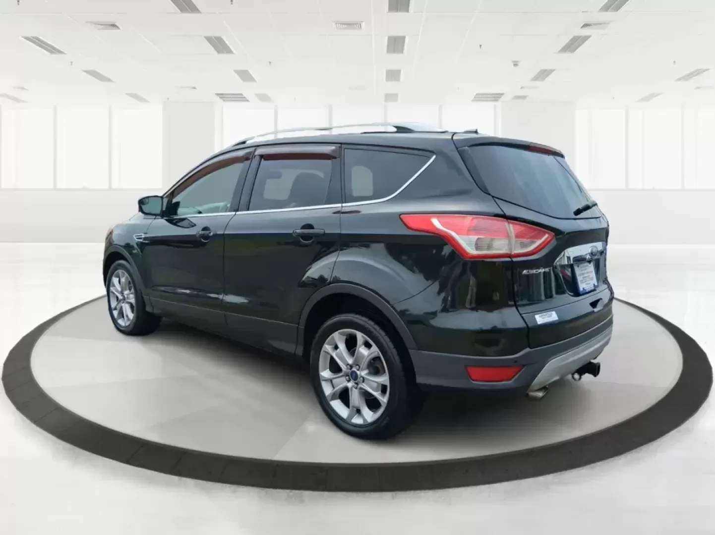 2014 Ford Escape Titanium (1FMCU9J96EU) with an EcoBoost 1.6L I-4 gasoline direct injection engine, located at 4508 South Dixie Dr, Moraine, OH, 45439, (937) 908-9800, 39.689976, -84.218452 - Photo#4
