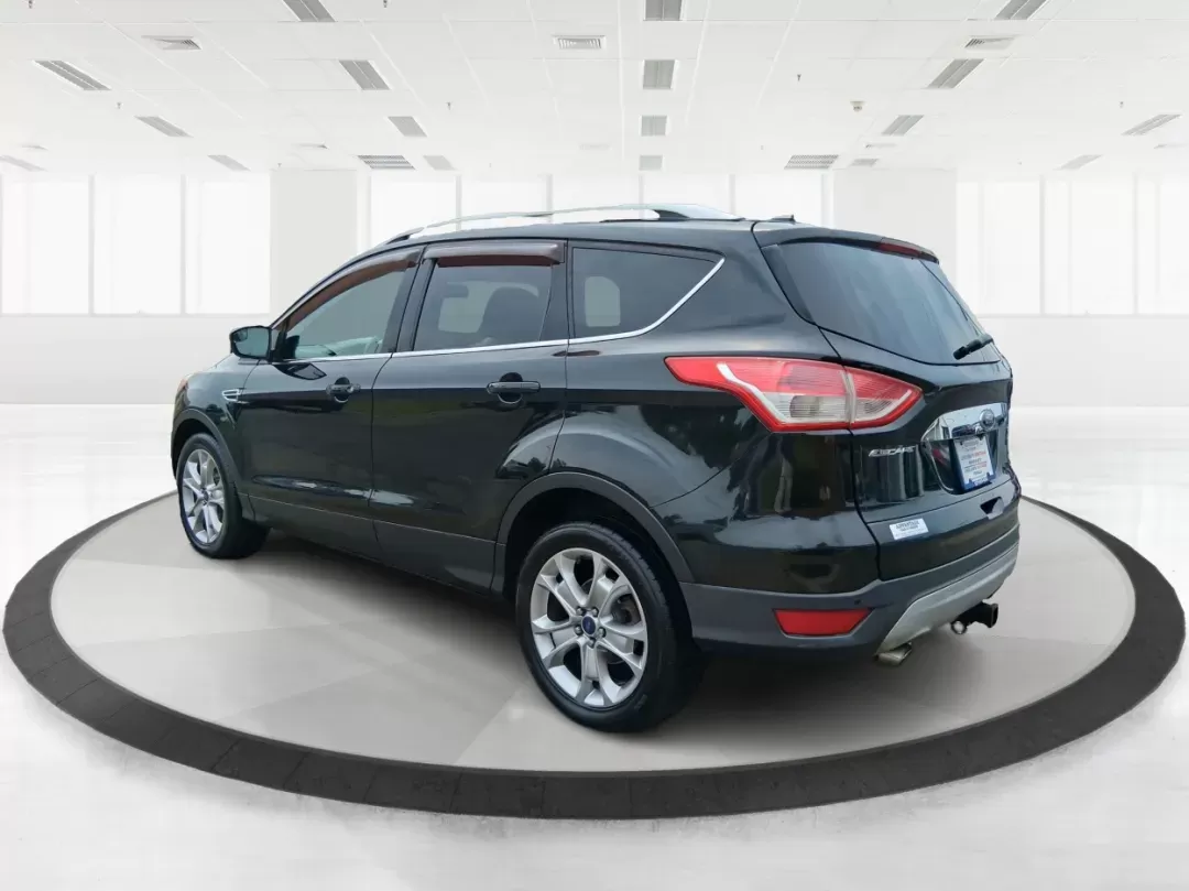 2014 Ford Escape Titanium (1FMCU9J96EU) with an EcoBoost 1.6L I-4 gasoline direct injection engine, located at 4508 South Dixie Dr, Moraine, OH, 45439, (937) 908-9800, 39.689976, -84.218452 - Photo#4