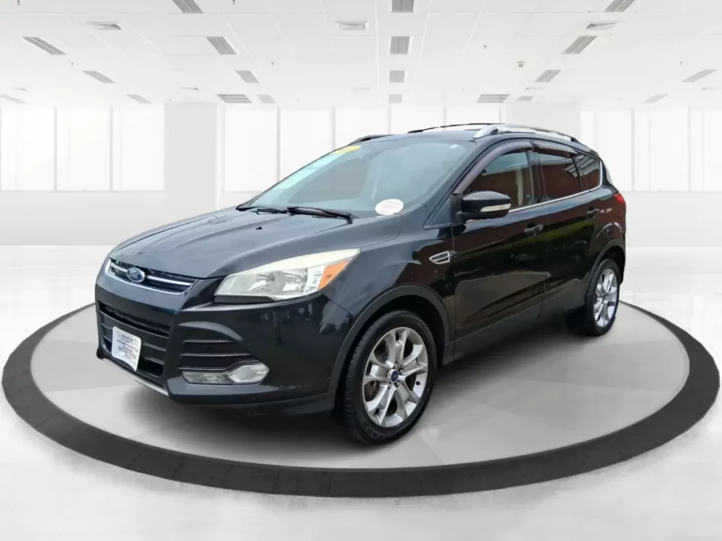 2014 Ford Escape Titanium (1FMCU9J96EU) with an EcoBoost 1.6L I-4 gasoline direct injection engine, located at 4508 South Dixie Dr, Moraine, OH, 45439, (937) 908-9800, 39.689976, -84.218452 - Photo#7
