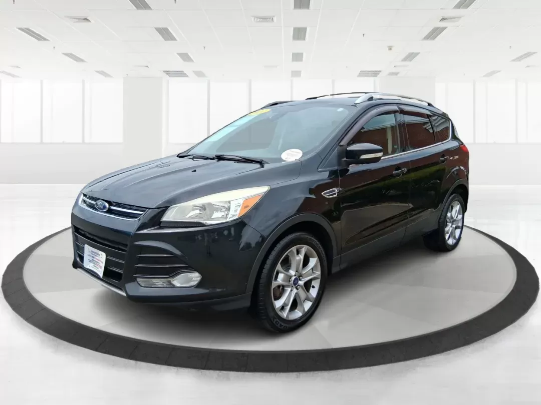 2014 Ford Escape Titanium (1FMCU9J96EU) with an EcoBoost 1.6L I-4 gasoline direct injection engine, located at 4508 South Dixie Dr, Moraine, OH, 45439, (937) 908-9800, 39.689976, -84.218452 - Photo#7