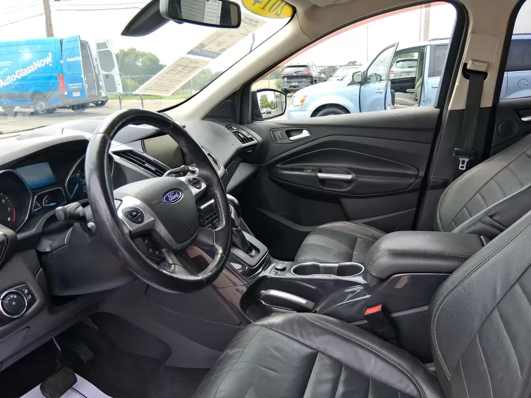 2014 Ford Escape Titanium (1FMCU9J96EU) with an EcoBoost 1.6L I-4 gasoline direct injection engine, located at 4508 South Dixie Dr, Moraine, OH, 45439, (937) 908-9800, 39.689976, -84.218452 - Photo#8