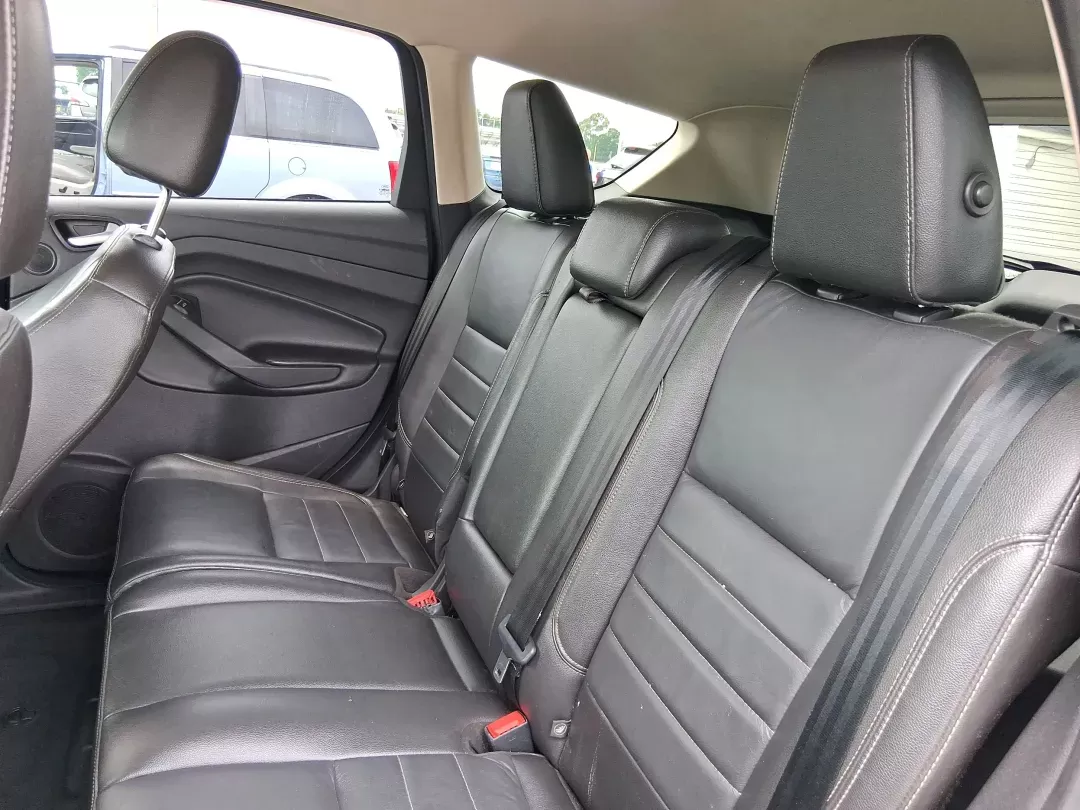 2014 Ford Escape Titanium (1FMCU9J96EU) with an EcoBoost 1.6L I-4 gasoline direct injection engine, located at 4508 South Dixie Dr, Moraine, OH, 45439, (937) 908-9800, 39.689976, -84.218452 - Photo#9