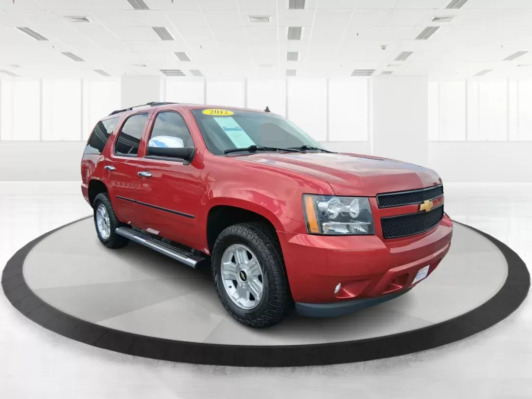 2012 Chevrolet Tahoe LTZ (1GNSKCE09CR) with an Vortec 5.3L V-8 variable valve control engine, located at 8750 N County Rd 25A, Piqua, OH, 45356, (937) 908-9800, 40.164391, -84.232513 - Photo#0