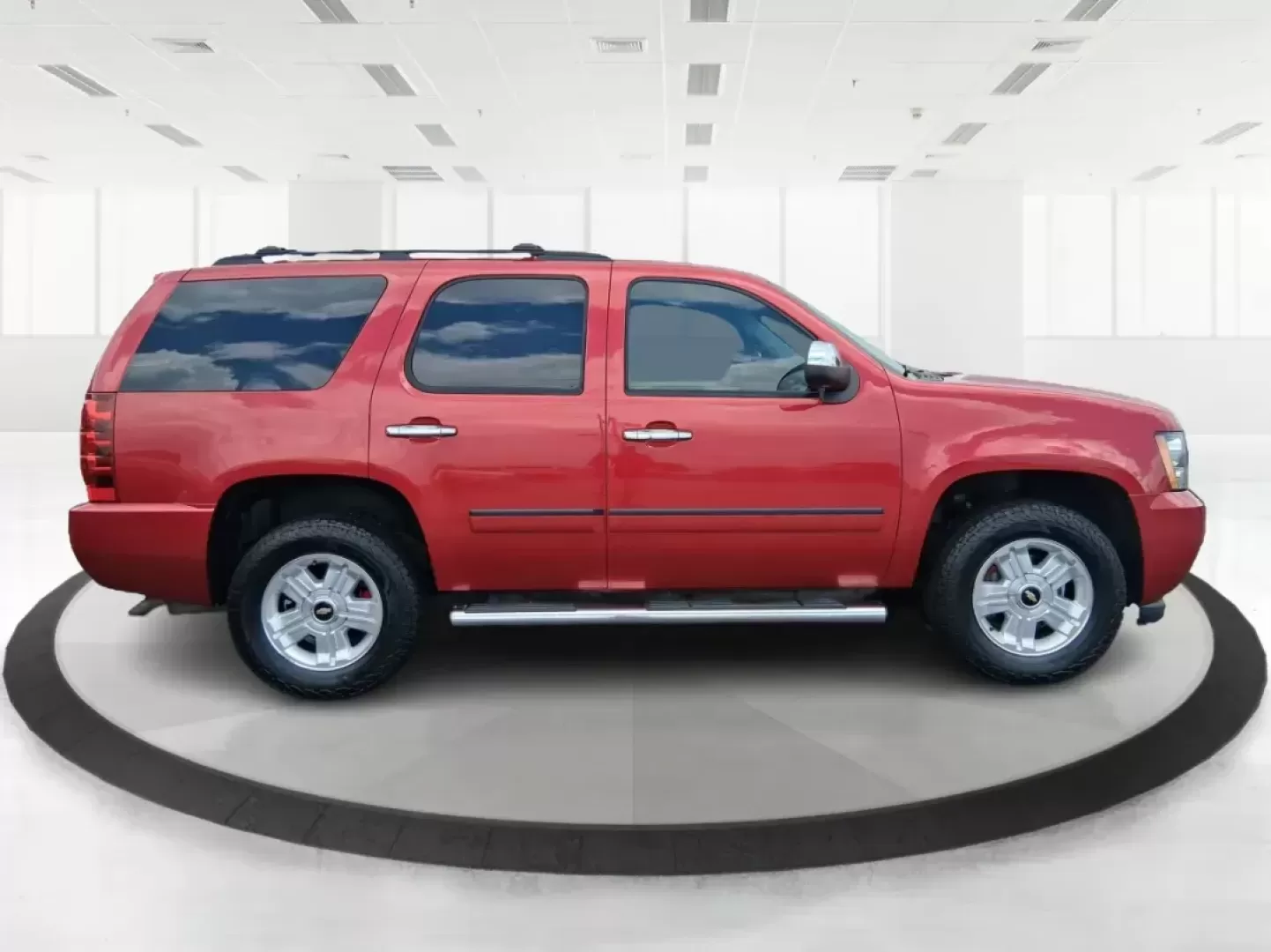 2012 Chevrolet Tahoe LTZ (1GNSKCE09CR) with an Vortec 5.3L V-8 variable valve control engine, located at 8750 N County Rd 25A, Piqua, OH, 45356, (937) 908-9800, 40.164391, -84.232513 - Photo#1
