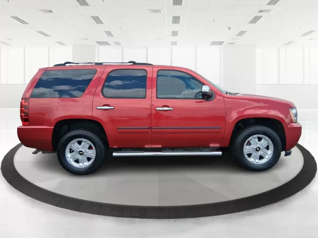 2012 Chevrolet Tahoe LTZ (1GNSKCE09CR) with an Vortec 5.3L V-8 variable valve control engine, located at 8750 N County Rd 25A, Piqua, OH, 45356, (937) 908-9800, 40.164391, -84.232513 - Photo#1