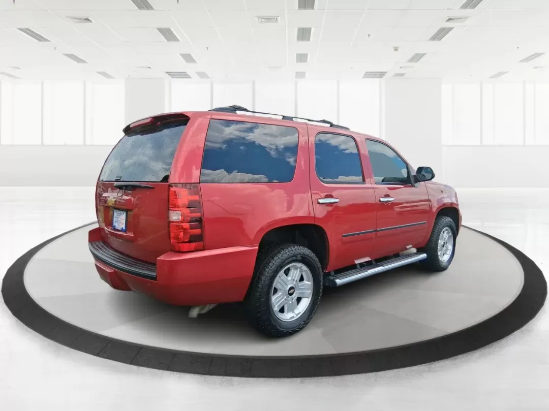 2012 Chevrolet Tahoe LTZ (1GNSKCE09CR) with an Vortec 5.3L V-8 variable valve control engine, located at 8750 N County Rd 25A, Piqua, OH, 45356, (937) 908-9800, 40.164391, -84.232513 - Photo#2
