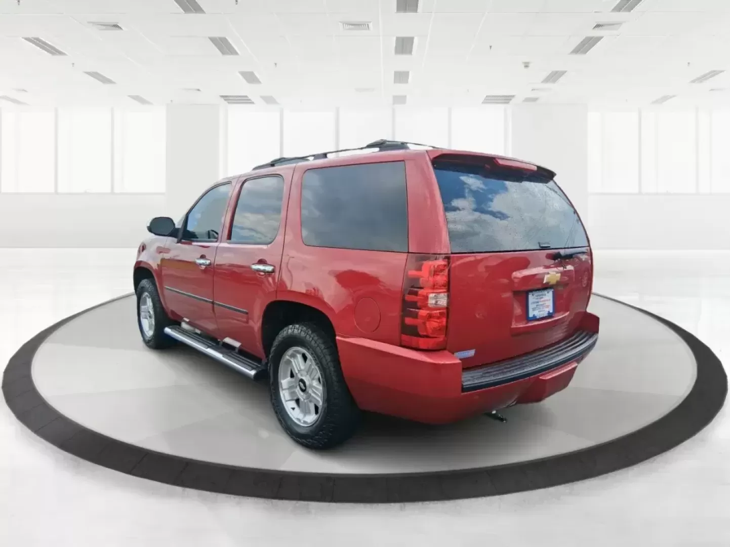 2012 Chevrolet Tahoe LTZ (1GNSKCE09CR) with an Vortec 5.3L V-8 variable valve control engine, located at 8750 N County Rd 25A, Piqua, OH, 45356, (937) 908-9800, 40.164391, -84.232513 - Photo#4