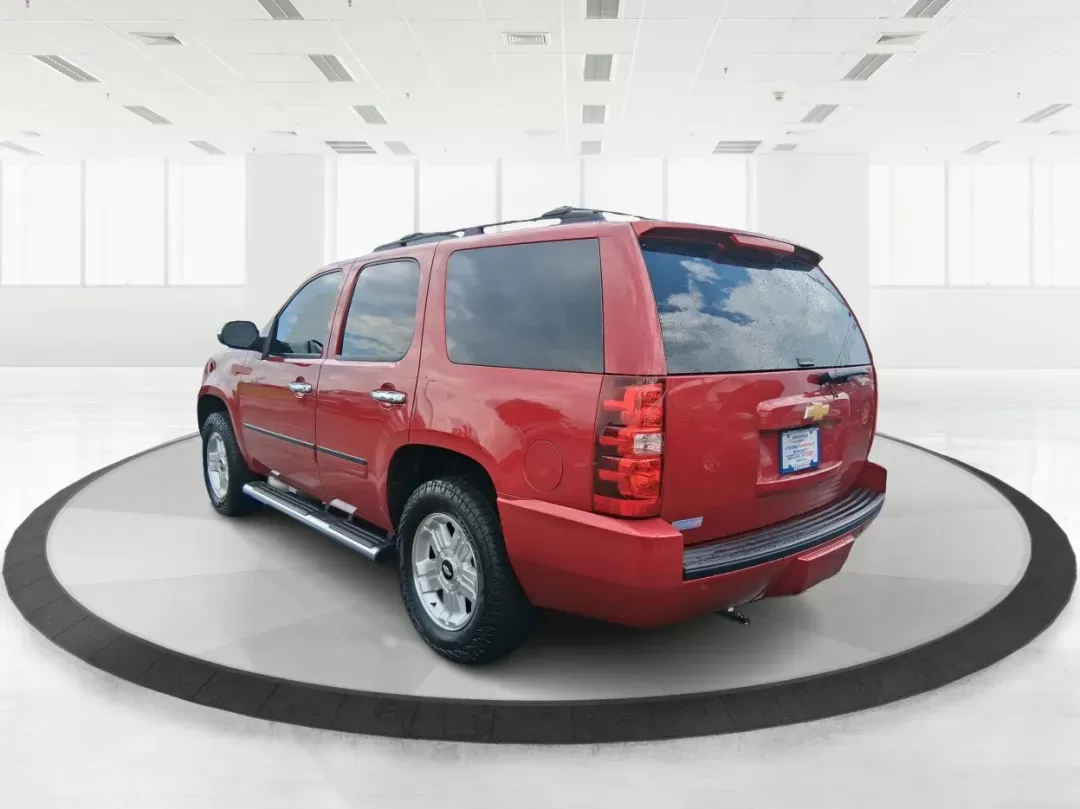 2012 Chevrolet Tahoe LTZ (1GNSKCE09CR) with an Vortec 5.3L V-8 variable valve control engine, located at 8750 N County Rd 25A, Piqua, OH, 45356, (937) 908-9800, 40.164391, -84.232513 - Photo#4