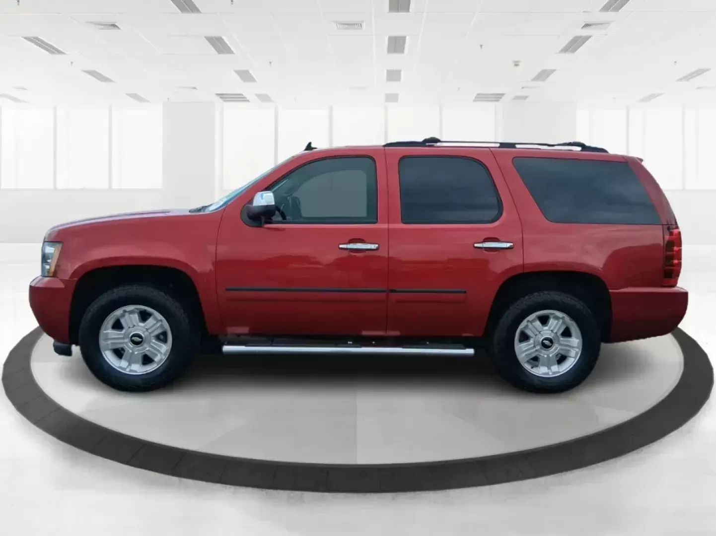 2012 Chevrolet Tahoe LTZ (1GNSKCE09CR) with an Vortec 5.3L V-8 variable valve control engine, located at 8750 N County Rd 25A, Piqua, OH, 45356, (937) 908-9800, 40.164391, -84.232513 - Photo#5