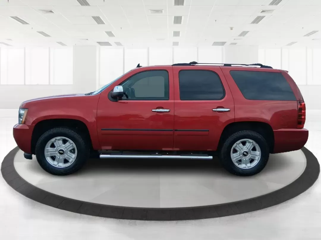 2012 Chevrolet Tahoe LTZ (1GNSKCE09CR) with an Vortec 5.3L V-8 variable valve control engine, located at 8750 N County Rd 25A, Piqua, OH, 45356, (937) 908-9800, 40.164391, -84.232513 - Photo#5