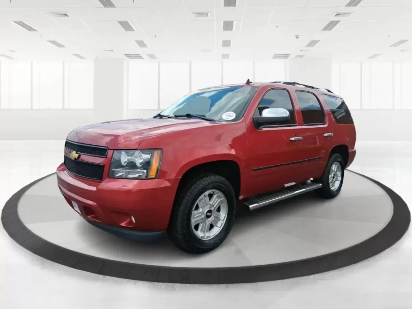 2012 Chevrolet Tahoe LTZ (1GNSKCE09CR) with an Vortec 5.3L V-8 variable valve control engine, located at 8750 N County Rd 25A, Piqua, OH, 45356, (937) 908-9800, 40.164391, -84.232513 - Photo#7